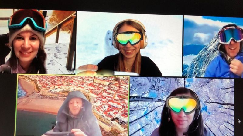 Participants in skiing goggles during Escape the Blizzard Online Teambuilding